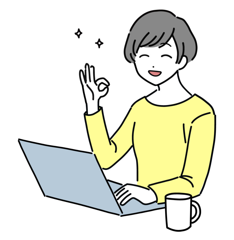 pcの前で笑う女性